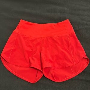 Red 4” Lululemon speed-ups (high rise)